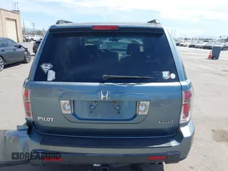 2007 Honda Pilot EX with VIN 2HKYF18447H520522, listed as a IAAI auction lot 42018937 with 128,401 mi miles. Bid and sale history available at carsss.com. Image 16.