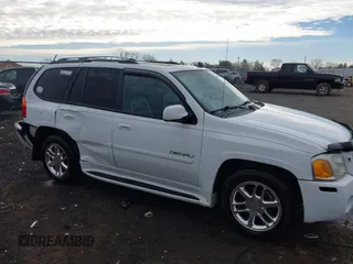 2008 GMC Envoy Denali with VIN 1GKET63M382216072, listed as a IAAI auction lot 41618044 with 148,598 mi miles. Bid and sale history available at carsss.com. Image 13.