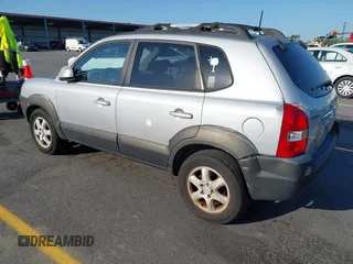 2005 Hyundai Tucson GLS with VIN KM8JN12D65U244033, listed as a IAAI auction lot 41998302 with 219,205 mi miles. Bid and sale history available at carsss.com. Image 3.