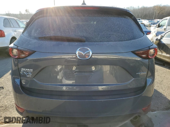 2021 Mazda CX-5 Touring with VIN JM3KFBCM5M0396053, listed as a Copart auction lot 83620274 with 50,463 mi miles and Salvage Title. Bid and sale history available at carsss.com. Image 6.