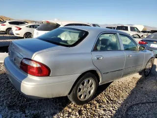 2001 Mazda 626 LX with VIN 1YVGF22C715241262, listed as a Copart auction lot 74259924 with 86,085 mi miles and Salvage Title. Bid and sale history available at carsss.com. Image 3.