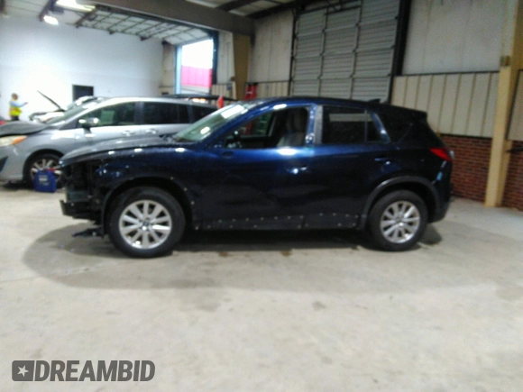 2016 Mazda CX-5 Sport with VIN JM3KE2BY5G0782385, listed as a IAAI auction lot 41971163 with 87,251 mi miles. Bid and sale history available at carsss.com. Image 15.