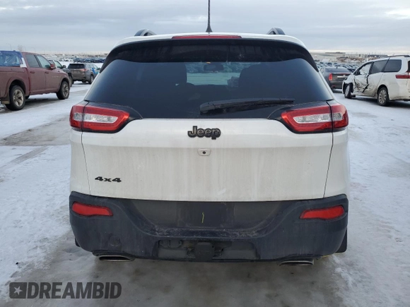 2018 Jeep Cherokee with VIN 1C4PJMAX7JD593297, listed as a Copart auction lot 88072195 with 36,817 mi miles and Salvage title. Bid and sale history available at DreamBid. Image 6.