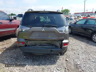 2010 Mitsubishi Outlander SE with VIN JA4AS3AW0AZ002972, listed as a IAAI auction lot 42220473 with 225,584 mi miles and . Bid and sale history available at DreamBid. Image 16.