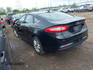 2014 Ford Fusion SE with VIN 1FA6P0H74E5392861, listed as a IAAI auction lot 42133099 with 130,373 mi miles. Bid and sale history available at carsss.com. Image 3.