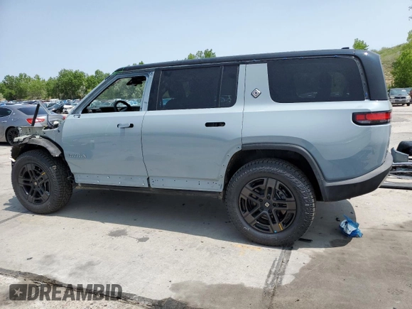 2025 Rivian R1S Adventure z VIN 7PDSGBBA2SN051004, wystawiony jako Copart lot #58999005 z przebiegiem 786 mil mil oraz Szkoda całkowita • Salvage title. Historia ofert i sprzedaży dostępna na DreamBid. Obrazek 2.