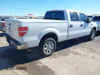 2014 Ford F-150 XL with VIN 1FTFW1CT8EKF75494, listed as a IAAI auction lot 41403654 with 144,432 mi miles. Bid and sale history available at carsss.com. Image 4.