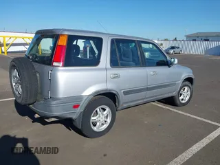 2001 Honda CR-V EX with VIN JHLRD18671C013132, listed as a IAAI auction lot 42057704 with 261,635 mi miles. Bid and sale history available at carsss.com. Image 4.