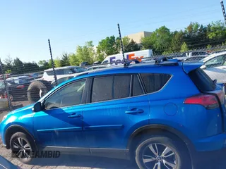 2018 Toyota RAV4 XLE with VIN JTMWFREV1JJ736877, listed as a IAAI auction lot 42072222 with 43,004 mi miles and . Bid and sale history available at carsss.com. Image 15.