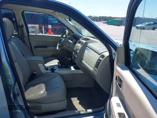 2008 Mercury Mariner Premier z VIN 4M2CU87188KJ39169, wystawiony jako IAAI lot #42299329 z przebiegiem 146 104 mil mil oraz . Historia ofert i sprzedaży dostępna na DreamBid. Obrazek 5.