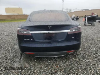 2013 Tesla Model S с VIN 5YJSA1CN5DFP13664, выставлен на аукционе Copart как лот 48177805 с пробегом 116 268 миль миль и Списание • Salvage title. История ставок и продаж доступна на DreamBid. Изображение 6.