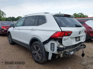 2019 Volkswagen Tiguan SE with VIN 3VV3B7AX6KM018161, listed as a IAAI auction lot 42279398 with 96,534 mi miles and . Bid and sale history available at DreamBid. Image 3.