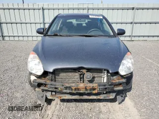 2011 Hyundai Accent L with VIN KMHCN3BC6BU206244, listed as a Copart auction lot 71718484 with 206,718 mi miles and Clean Title. Bid and sale history available at carsss.com. Image 5.