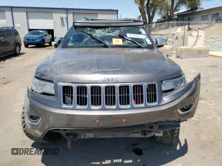 2014 Jeep Grand Cherokee Limited with VIN 1C4RJFBM3EC384398, listed as a Copart auction lot 57703835 with 153,255 mi miles and Salvage title. Bid and sale history available at DreamBid. Image 5.