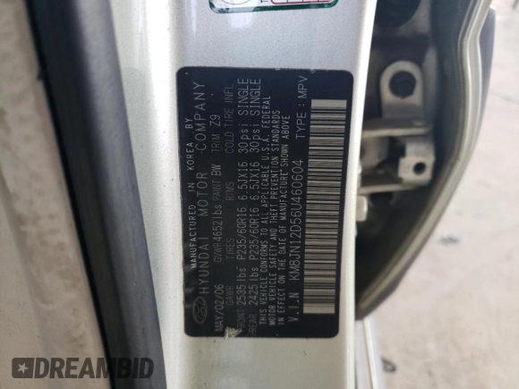 2006 Hyundai Tucson GLS with VIN KM8JN12D56U460604, listed as a Copart auction lot 78459004 with 140,947 mi miles and Salvage Title. Bid and sale history available at carsss.com. Image 14.