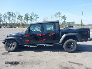 2022 Jeep Gladiator Texas Trail z VIN 1C6HJTAGXNL101704, wystawiony jako IAAI lot #41590378 z przebiegiem 29 299 mil mil oraz . Historia ofert i sprzedaży dostępna na DreamBid. Obrazek 14.