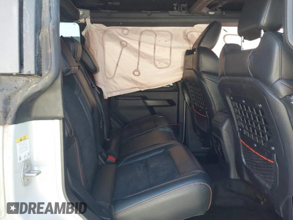 2023 Ford Bronco Raptor with VIN 1FMEE5JR7PLC04106, listed as a IAAI auction lot 42316422 with 6,859 mi miles and . Bid and sale history available at DreamBid. Image 8.