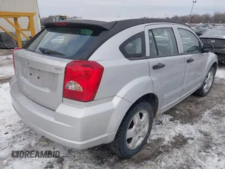 2007 Dodge Caliber SXT with VIN 1B3HB48B07D159549, listed as a IAAI auction lot 41330969 with 124,911 mi miles and . Bid and sale history available at DreamBid. Image 4.