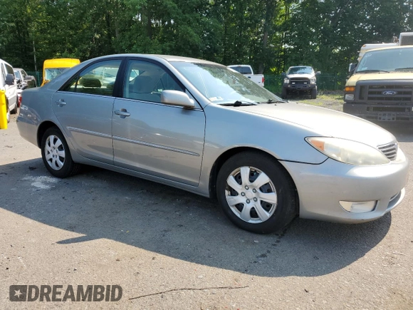 2005 Toyota Camry LE with VIN 4T1BE30K95U590370, listed as a Copart auction lot 63141505 with 238,510 mi miles and Salvage title. Bid and sale history available at DreamBid. Image 4.