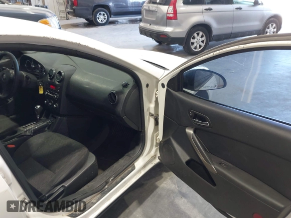 2008 Pontiac G6 z VIN 1G2ZG57B584188272, wystawiony jako IAAI lot #41977633 z przebiegiem 212 403 mil mil oraz . Historia ofert i sprzedaży dostępna na DreamBid. Obrazek 5.