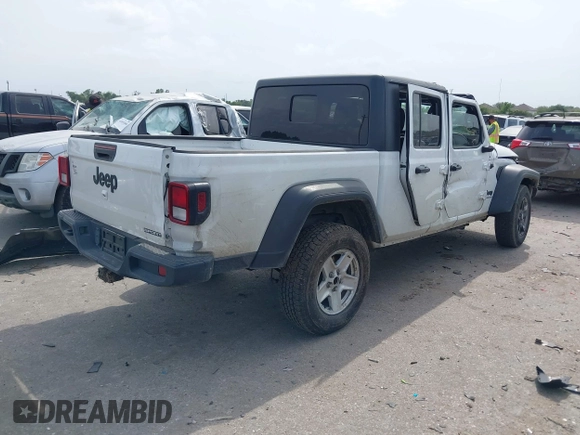 2020 Jeep Gladiator Sport S with VIN 1C6HJTAG9LL161535, listed as a IAAI auction lot 42053904 with 104,260 mi miles and . Bid and sale history available at DreamBid. Image 4.
