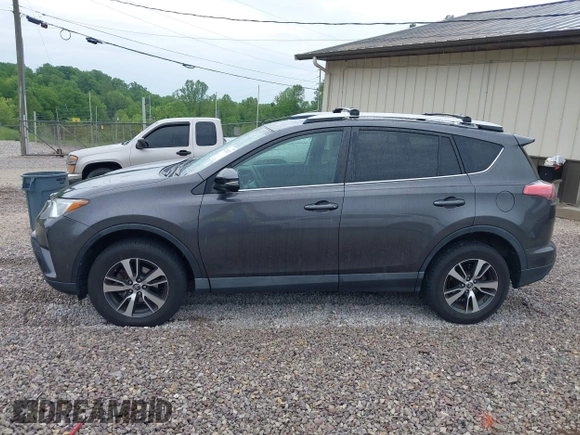 2016 Toyota RAV4 XLE with VIN 2T3RFREV4GW494108, listed as a IAAI auction lot 42234227 with 102,216 mi miles and . Bid and sale history available at DreamBid. Image 14.
