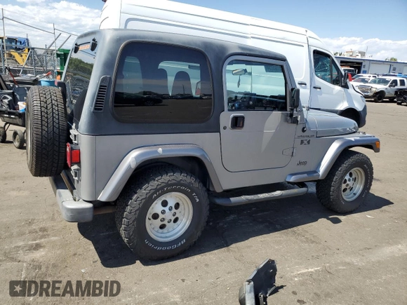 2002 Jeep Wrangler X with VIN 1J4FA39S32P708163, listed as a Copart auction lot 69703254 with 119,843 mi miles and Salvage Title. Bid and sale history available at carsss.com. Image 3.