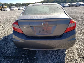 2012 Honda Civic EX-L with VIN 19XFB2F94CE048523, listed as a Copart auction lot 77019404 with 210,391 mi miles and Salvage Title. Bid and sale history available at DreamBid. Image 6.