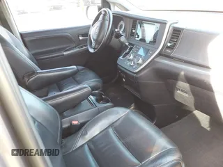 2015 Toyota Sienna SE with VIN 5TDXK3DC8FS633124, listed as a IAAI auction lot 41475935 with 182,921 mi miles and . Bid and sale history available at DreamBid. Image 5.