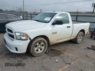 2018 Ram 1500 Tradesman with VIN 3C6JR6AG2JG158109, listed as a IAAI auction lot 41456891 with 102,851 mi miles and . Bid and sale history available at DreamBid. Image 16.