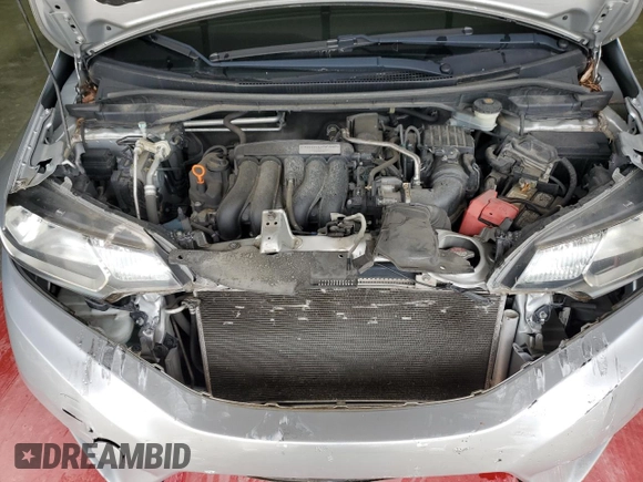 2016 Honda Fit LX with VIN JHMGK5H50GX005947, listed as a Copart auction lot 57699275 with 103,698 mi miles and Salvage title. Bid and sale history available at DreamBid. Image 11.