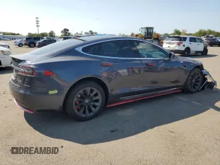 2019 Tesla Model S 100D с VIN 5YJSA1E42KF312803, выставлен на аукционе Copart как лот 71246484 с пробегом 89 820 миль миль и На запчасти • Non repairable. История ставок и продаж доступна на DreamBid. Изображение 3.