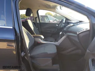2015 Ford Escape SE with VIN 1FMCU9G91FUB50352, listed as a IAAI auction lot 40639198 with 126,862 mi miles. Bid and sale history available at carsss.com. Image 5.
