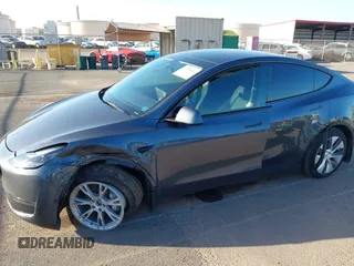 2023 Tesla Model Y Long Range with VIN 7SAYGDEE0PF928836, listed as a IAAI auction lot 41538742 with 9,630 mi miles and . Bid and sale history available at DreamBid. Image 6.