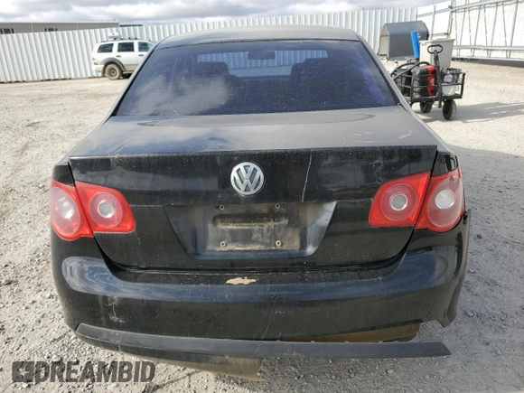 2006 Volkswagen Jetta 1.9L TDI z VIN 3VWST71K46M621589, wystawiony jako Copart lot #49905355 z przebiegiem 335 621 mil mil oraz Szkoda całkowita • Salvage title. Historia ofert i sprzedaży dostępna na DreamBid. Obrazek 6.