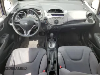 2009 Honda Fit with VIN JHMGE88229S049270, listed as a Copart auction lot 56935235 with 118,649 mi miles and Salvage title. Bid and sale history available at DreamBid. Image 8.