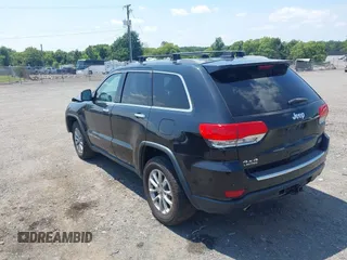 2014 Jeep Grand Cherokee Limited with VIN 1C4RJFBTXEC140898, listed as a IAAI auction lot 42793097 with 159,542 mi miles and . Bid and sale history available at DreamBid. Image 3.