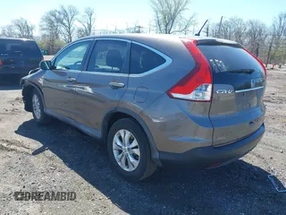 2014 Honda CR-V EX with VIN 2HKRM4H50EH628721, listed as a IAAI auction lot 42064143 with 103,009 mi miles and . Bid and sale history available at carsss.com. Image 3.