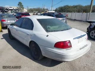 2003 Mercury Sable GS with VIN 1MEFM50U33A629599, listed as a IAAI auction lot 41579245 with 128,198 mi miles. Bid and sale history available at carsss.com. Image 3.