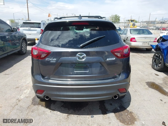 2016 Mazda CX-5 Grand Touring with VIN JM3KE4DY7G0643643, listed as a IAAI auction lot 42077497 with 120,343 mi miles. Bid and sale history available at carsss.com. Image 16.