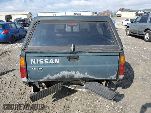 1994 Nissan Frontier with VIN 1N6SD11S4RC405080, listed as a Copart auction lot 82565904 with 154,400 mi miles and Salvage title. Bid and sale history available at DreamBid. Image 6.