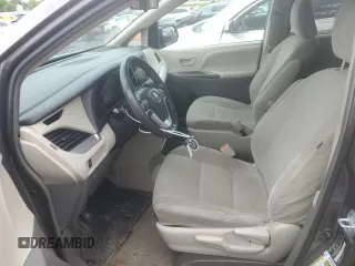 2016 Toyota Sienna L with VIN 5TDZK3DC4GS709089, listed as a Copart auction lot 58990195 with 153,182 mi miles and Salvage title. Bid and sale history available at DreamBid. Image 7.