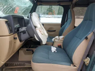 1999 Jeep Wrangler Sahara with VIN 1J4FY49S0XP489462, listed as a Copart auction lot 54750405 with 134,134 mi miles and Non repairable. Bid and sale history available at DreamBid. Image 7.
