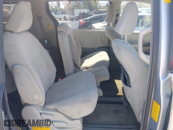 2014 Toyota Sienna LE AAS z VIN 5TDKK3DC9ES453868, wystawiony jako IAAI lot #41816259 z przebiegiem 169 468 mil mil oraz . Historia ofert i sprzedaży dostępna na DreamBid. Obrazek 8.