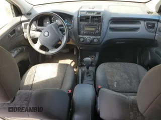 2006 Kia Sportage LX z VIN KNDJF724X67282904, wystawiony jako Copart lot #69264114 z przebiegiem 231 772 mil mil oraz Czysty tytuł • Clean title. Historia ofert i sprzedaży dostępna na DreamBid. Obrazek 8.