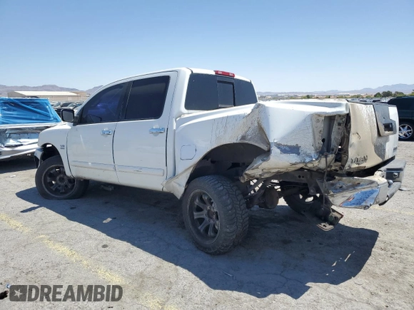 2004 Nissan Titan SE with VIN 1N6AA07A24N521744, listed as a Copart auction lot 58012925 with 268,270 mi miles and Salvage title. Bid and sale history available at DreamBid. Image 2.