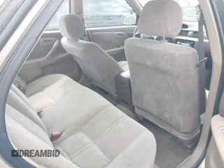 2000 Toyota Camry LE z VIN 4T1BF22K5YU938013, wystawiony jako IAAI lot #42477316 z przebiegiem 239 736 mil mil oraz . Historia ofert i sprzedaży dostępna na DreamBid. Obrazek 8.