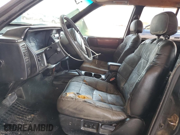 1994 Jeep Grand Cherokee Limited with VIN 1J4GZ78S5RC304501, listed as a Copart auction lot 64632335 with 184,333 mi miles and Salvage title. Bid and sale history available at DreamBid. Image 7.