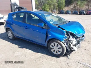 2012 Toyota Prius c One with VIN JTDKDTB38C1527448, listed as a IAAI auction lot 42070550 with Not Provided miles. Bid and sale history available at carsss.com. Image 1.