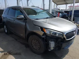 2017 Kia Sorento LX z VIN 5XYPG4A30HG189880, wystawiony jako IAAI lot #42383908 z przebiegiem 114 686 mil mil oraz . Historia ofert i sprzedaży dostępna na DreamBid. Obrazek 1.